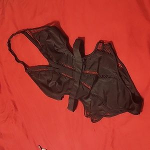 DONATED!!!!!     Beautiful black one piece with cut out detail at the waist